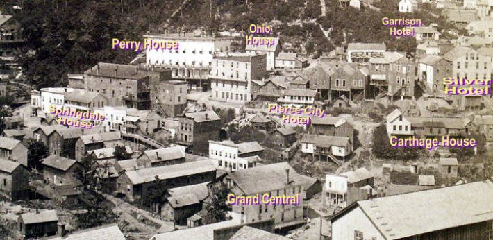 1882 photo showing various hotels of an earlier era, the Grand Central at bottom was a wooden rectangular building.